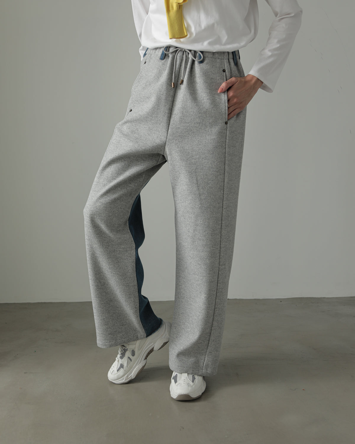 by color Different material denim pants