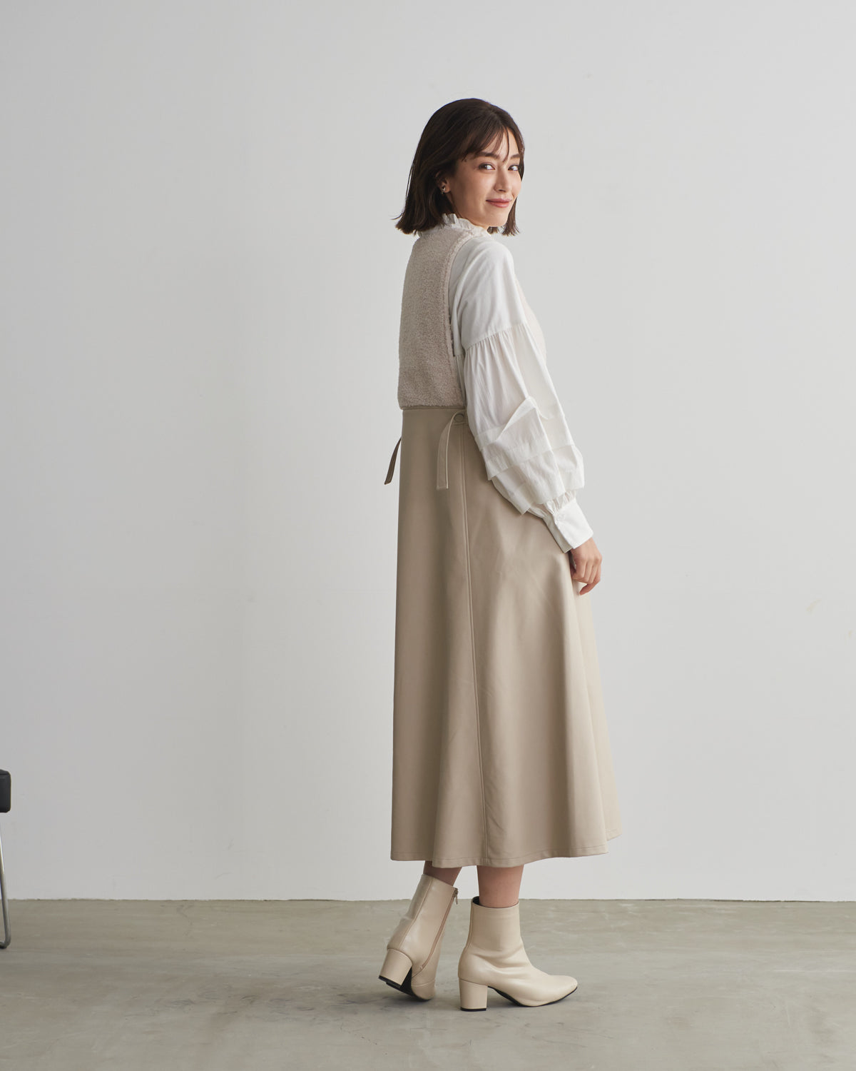 boa switching synthetic leather jumper skirt