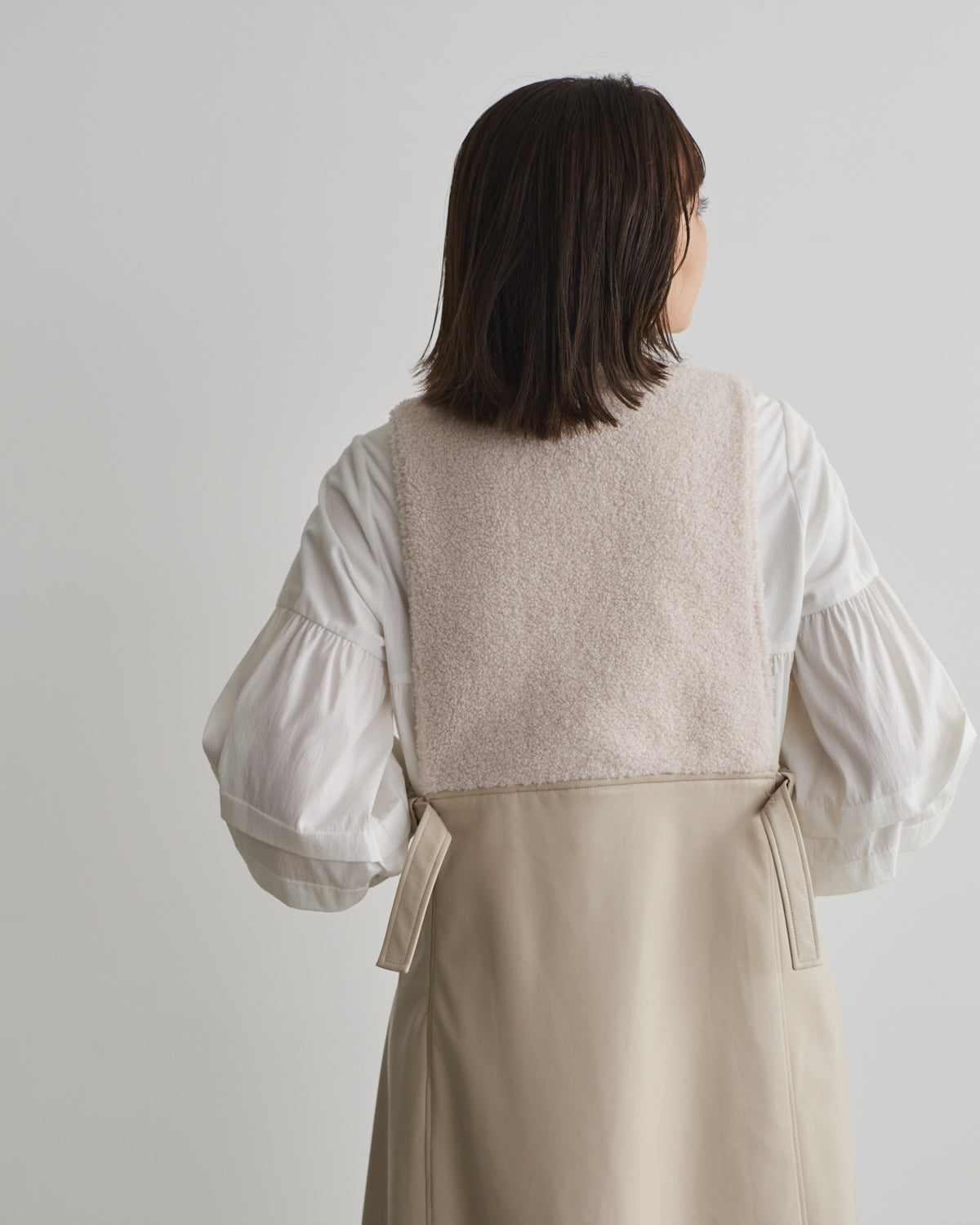 boa switching synthetic leather jumper skirt
