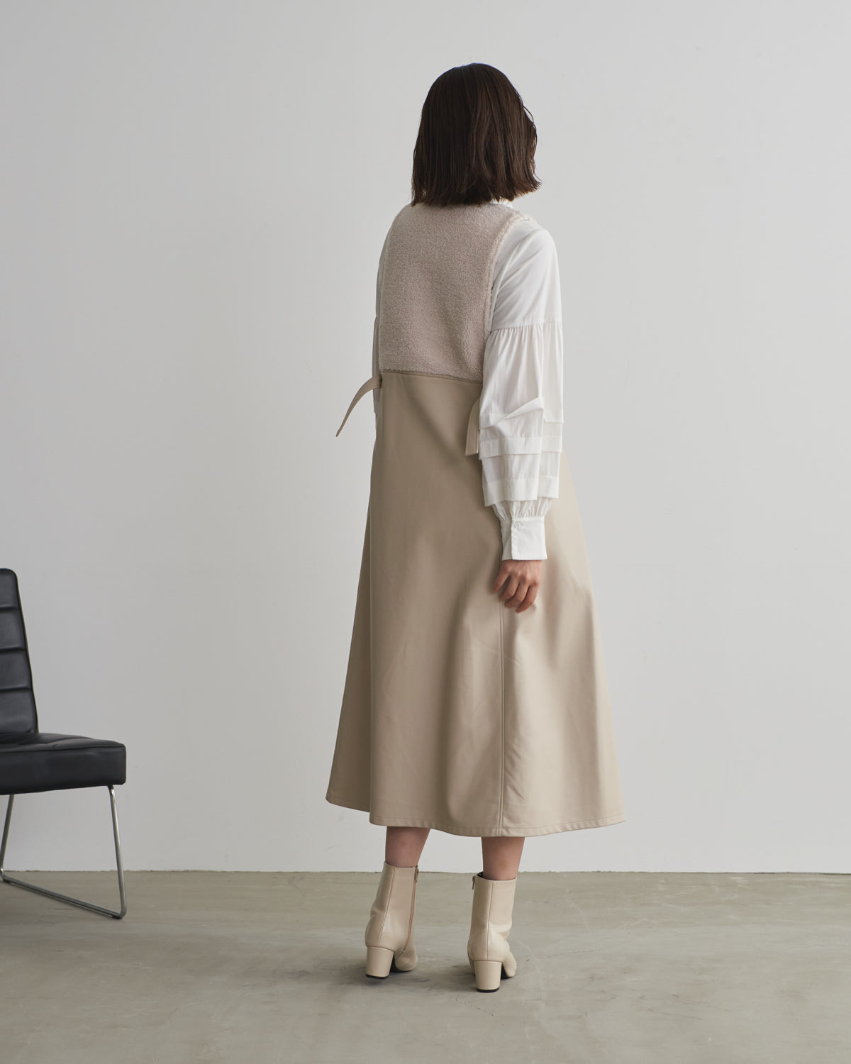 boa switching synthetic leather jumper skirt