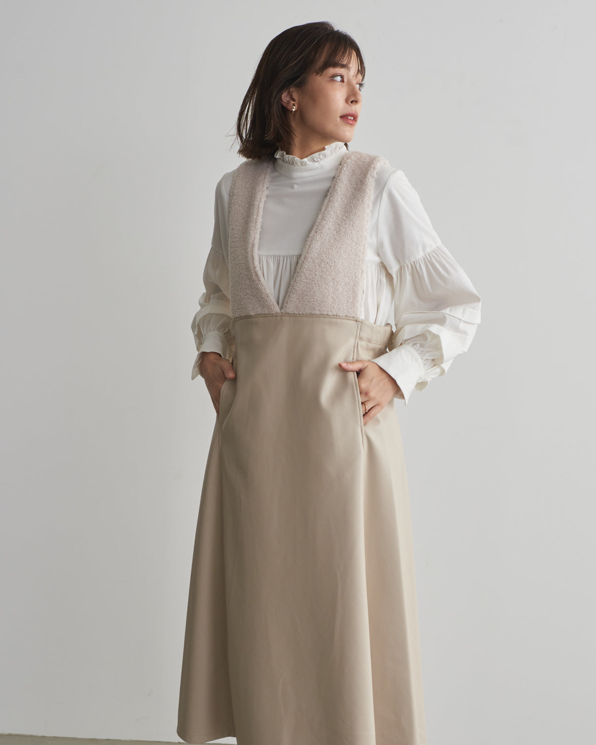 boa switching synthetic leather jumper skirt