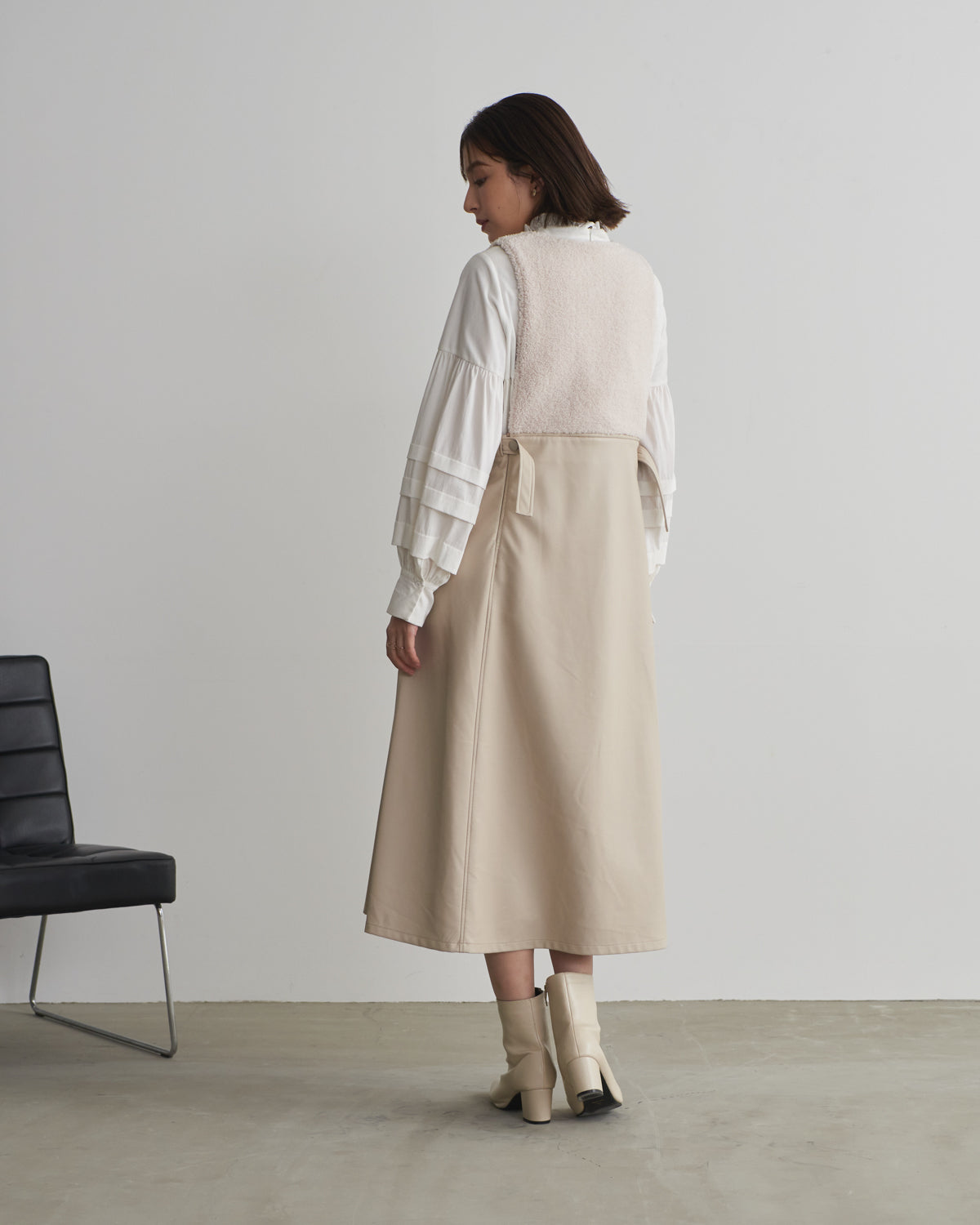 boa switching synthetic leather jumper skirt