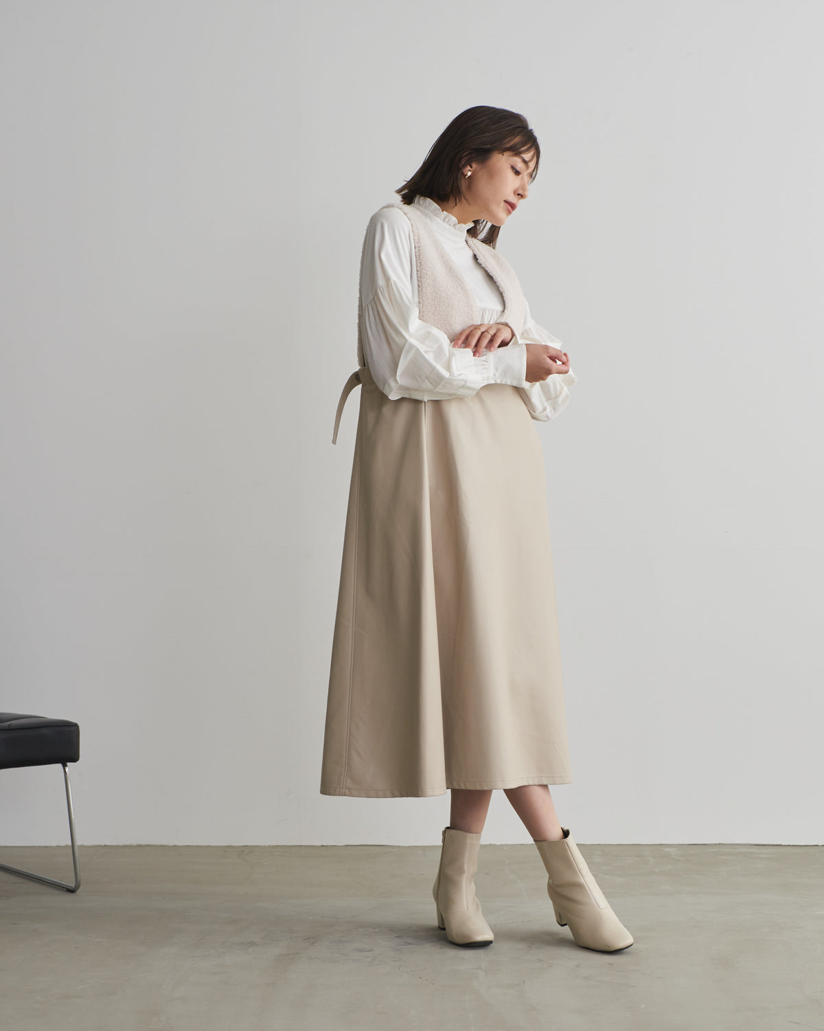 boa switching synthetic leather jumper skirt