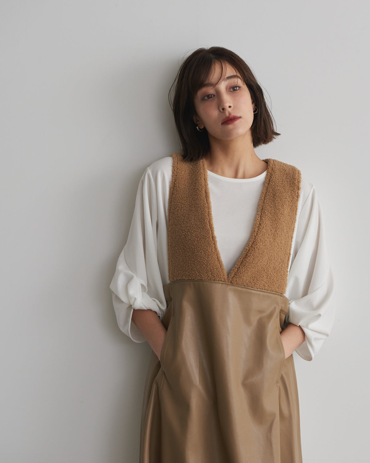 boa switching synthetic leather jumper skirt