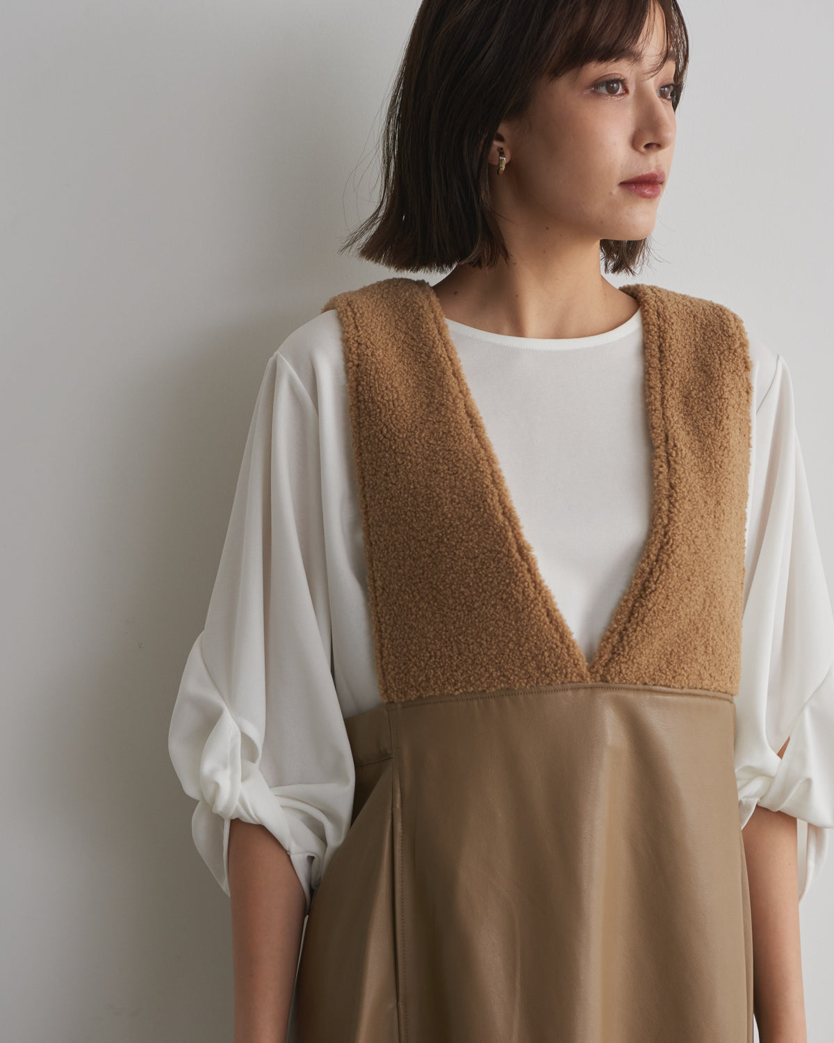 boa switching synthetic leather jumper skirt