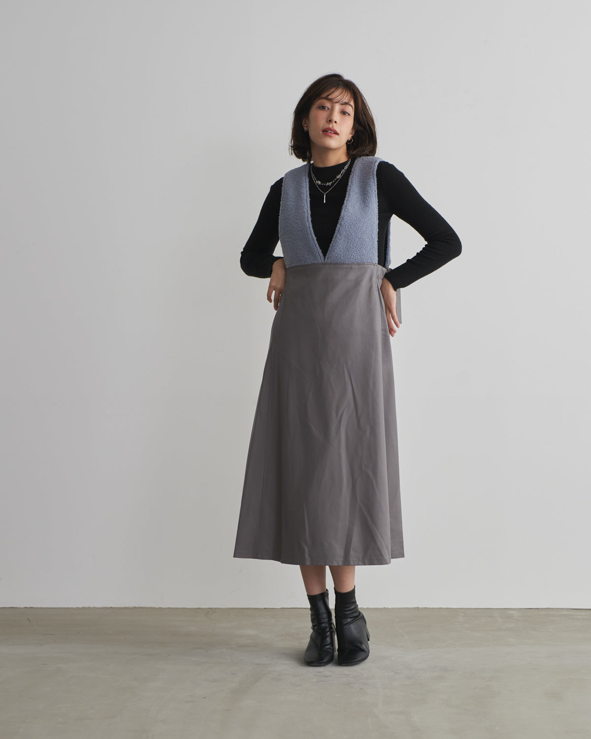 boa switching synthetic leather jumper skirt