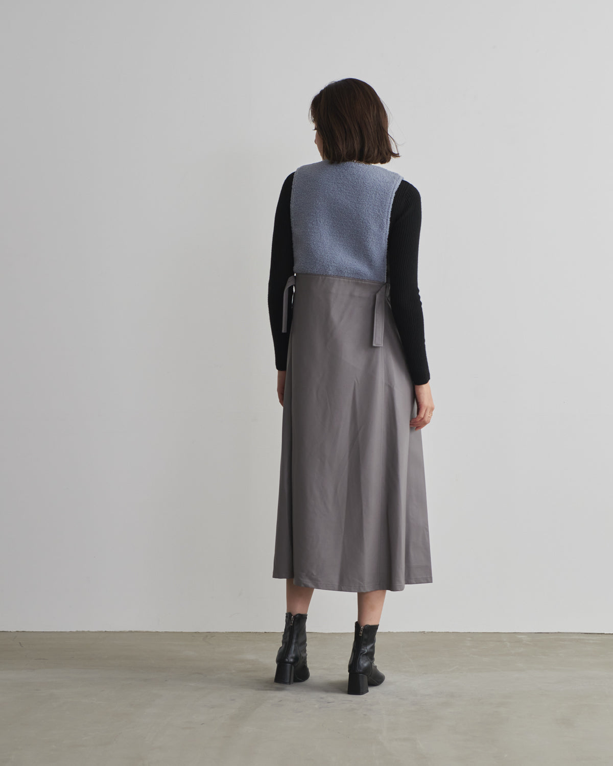 boa switching synthetic leather jumper skirt
