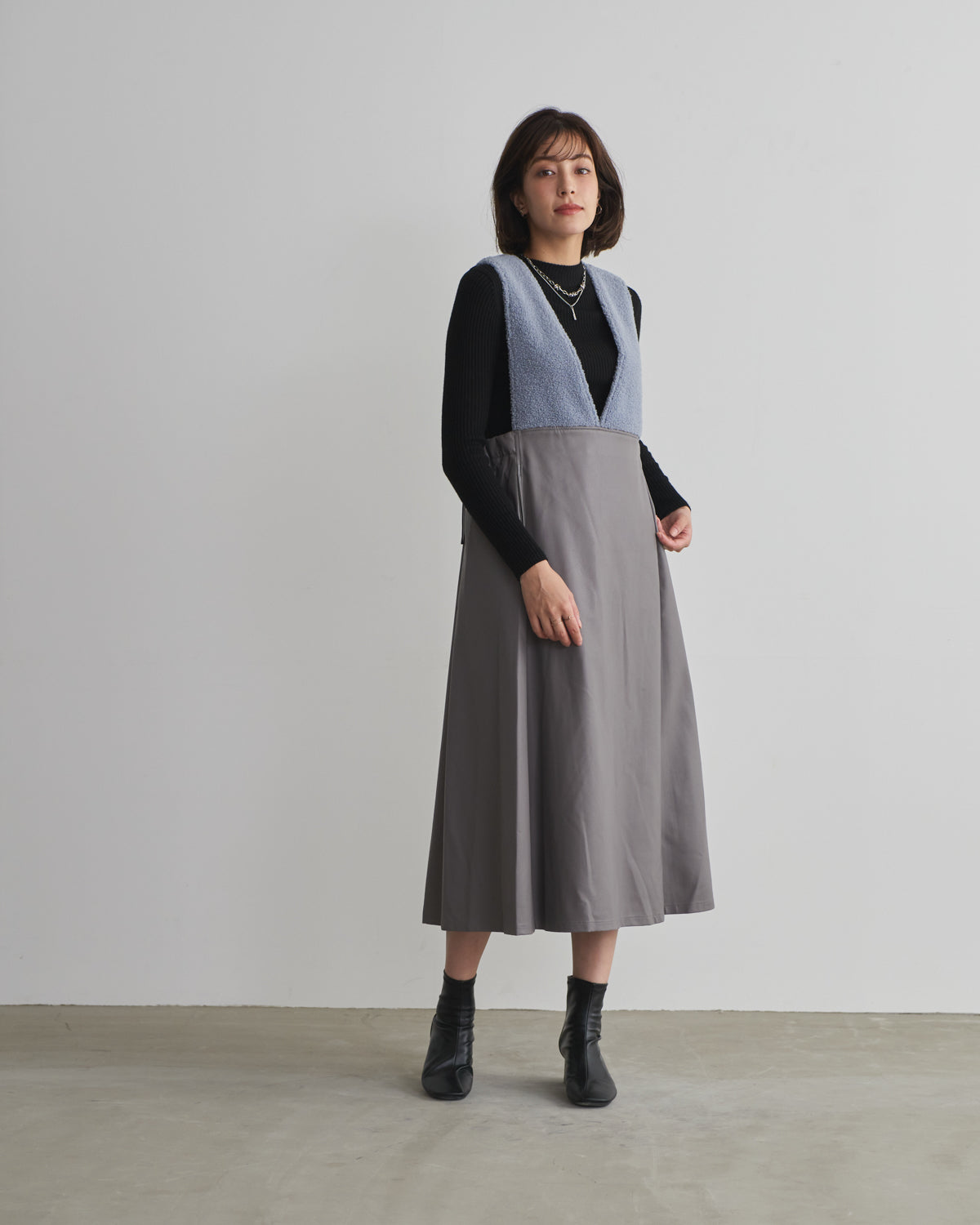 boa switching synthetic leather jumper skirt
