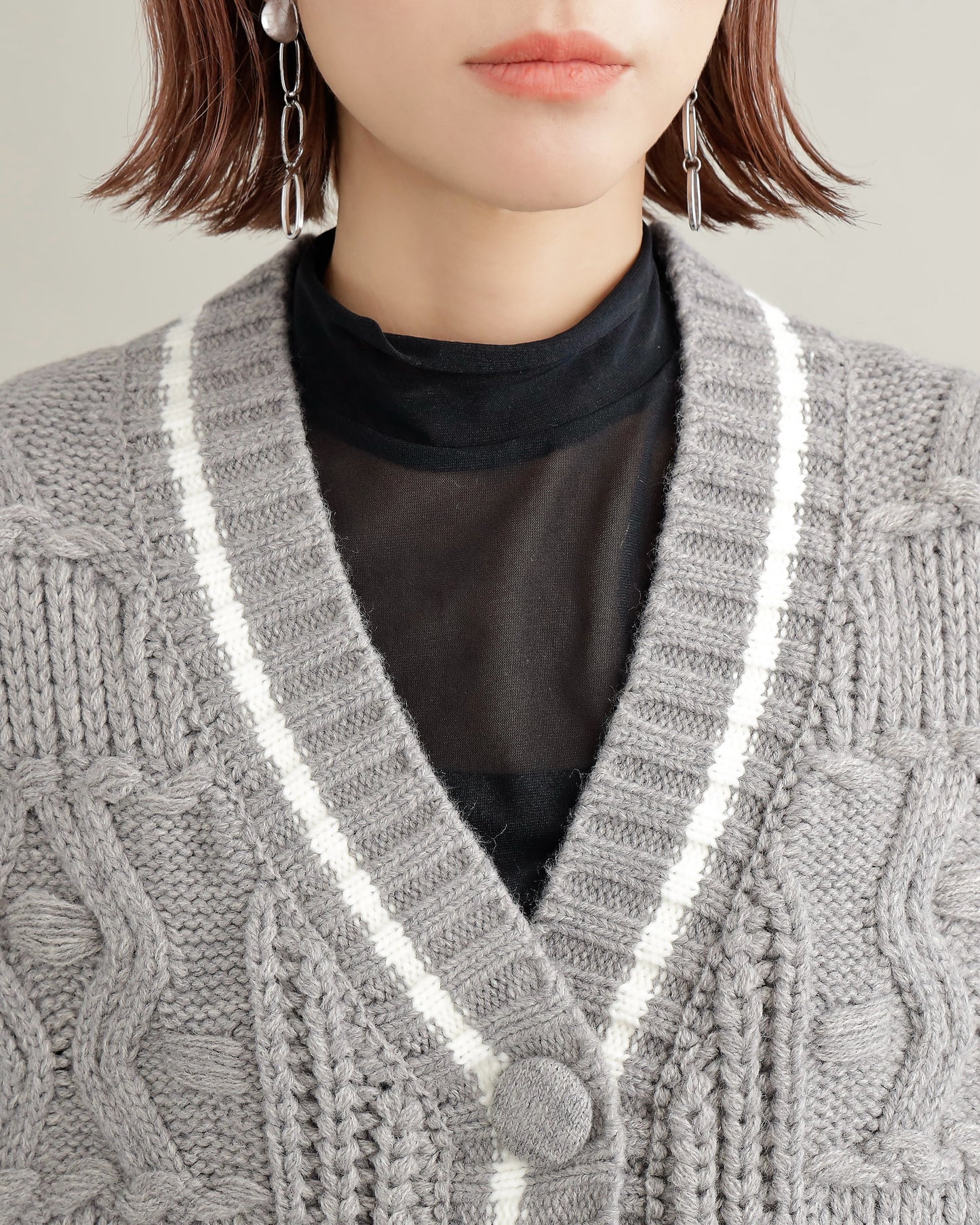 デニムスリーブ異素材ミックスケーブルニットカーディガン