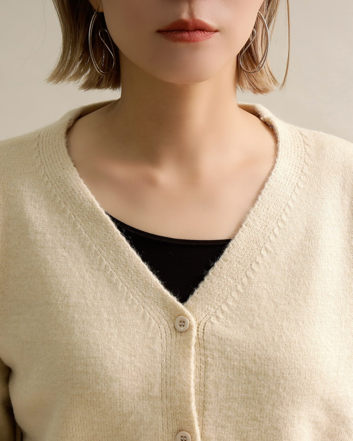 バックロゴショートカーディガン
